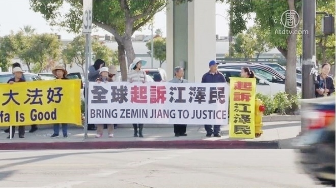 《九评》11周年 真相长城现华人闹区(视频)