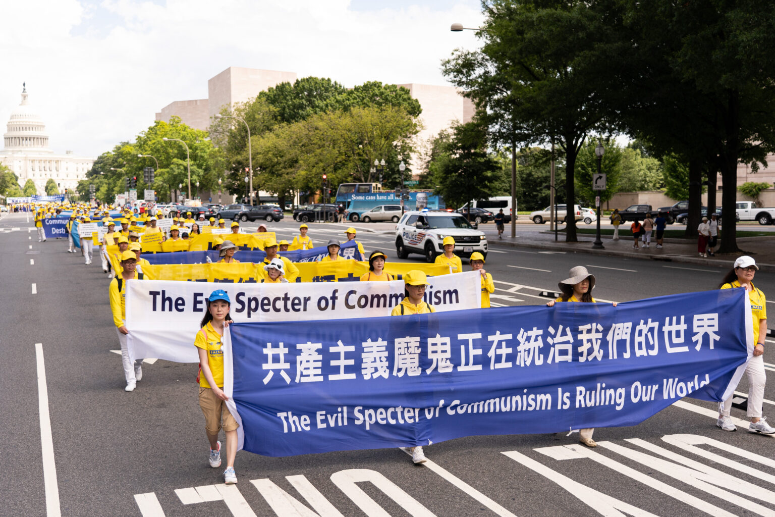 2019年7月18日,部分法轮功学员在美国首都华盛顿DC游行,呼吁人们认清共产主义邪恶本质,远离中共。(退党服务中心)